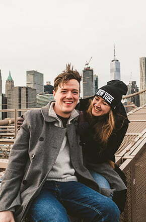 a couple on Brooklyn Bridge